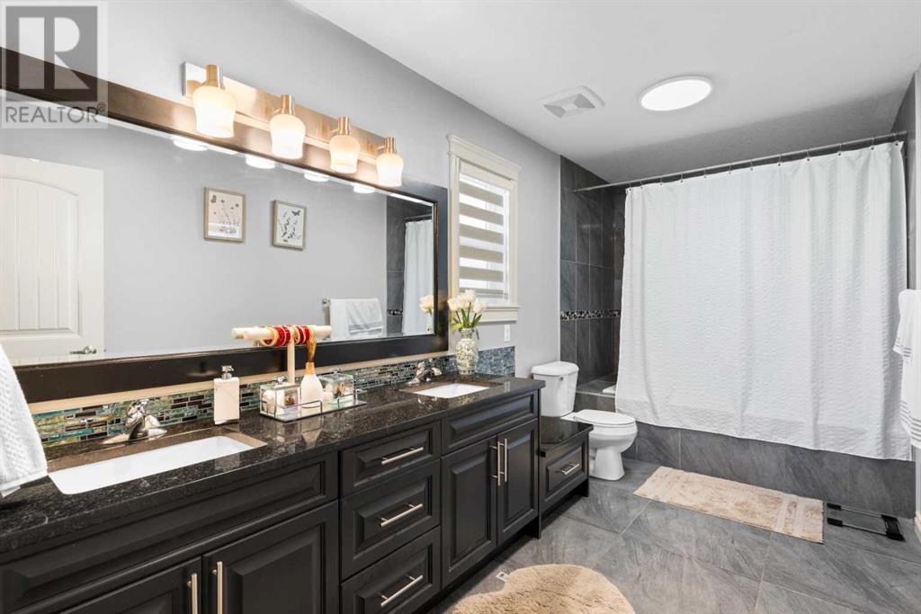 Photo 34 of 409 Kinniburgh Boulevard, Chestermere AB