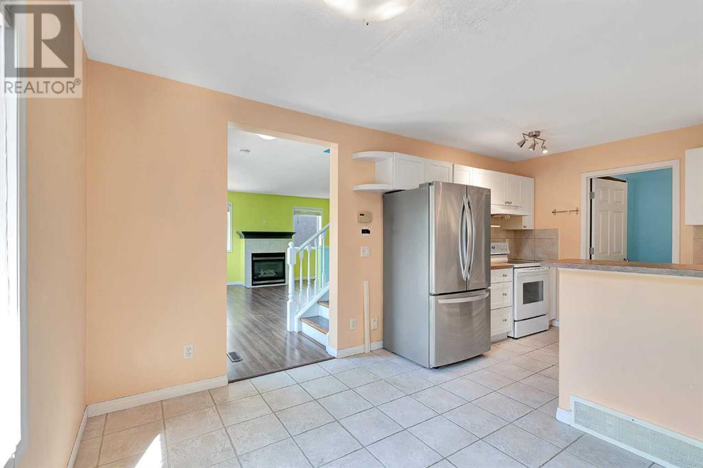 Single Family House for Sale in  Simcoe Place SW Signal Hill Calgary 