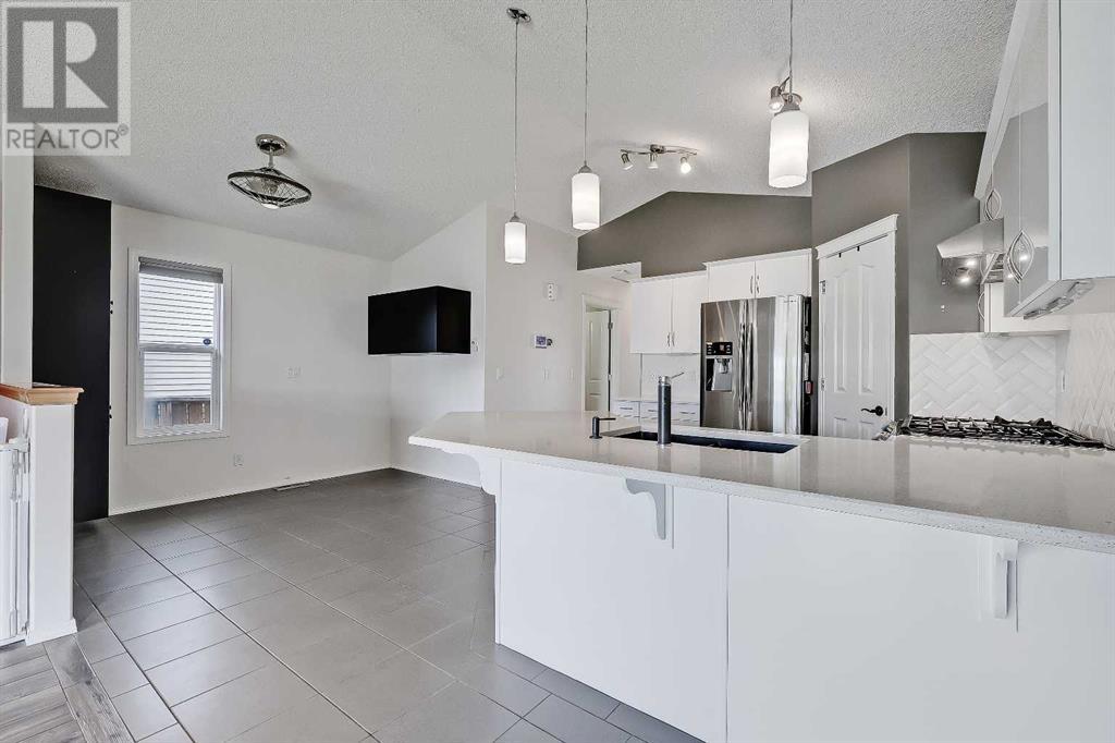 Single Family House Bungalow for Sale in  Cramond Green SE Cranston Calgary 