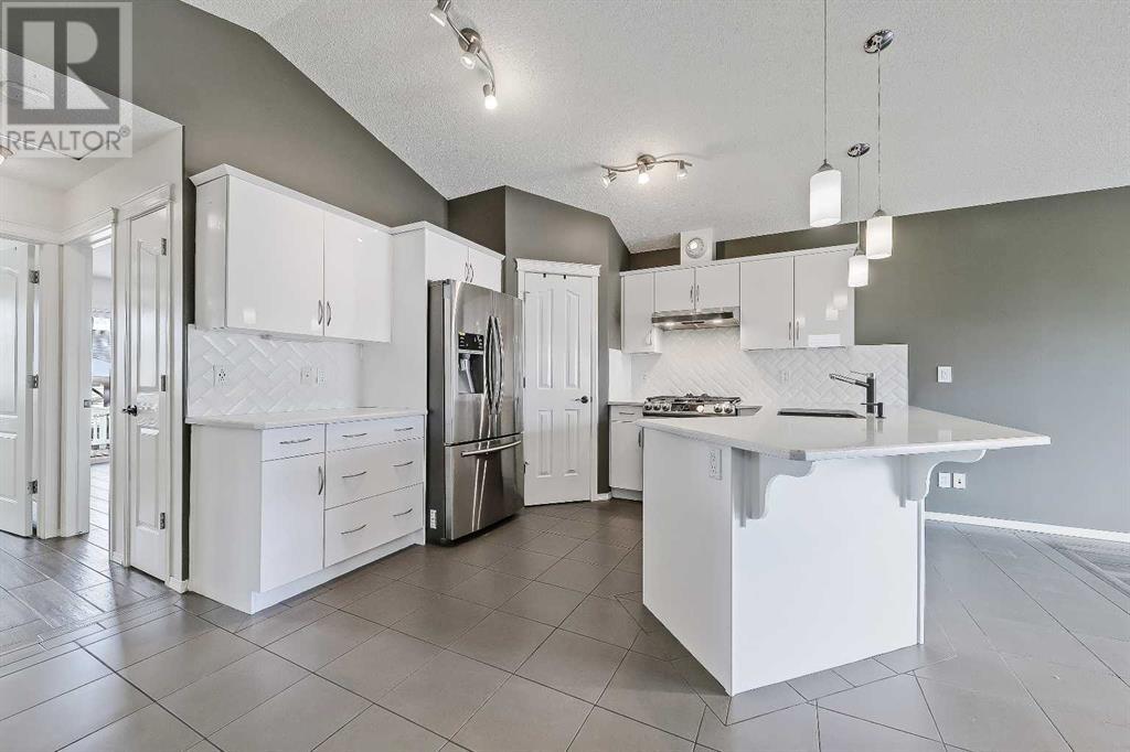 Single Family House Bungalow for Sale in  Cramond Green SE Cranston Calgary 