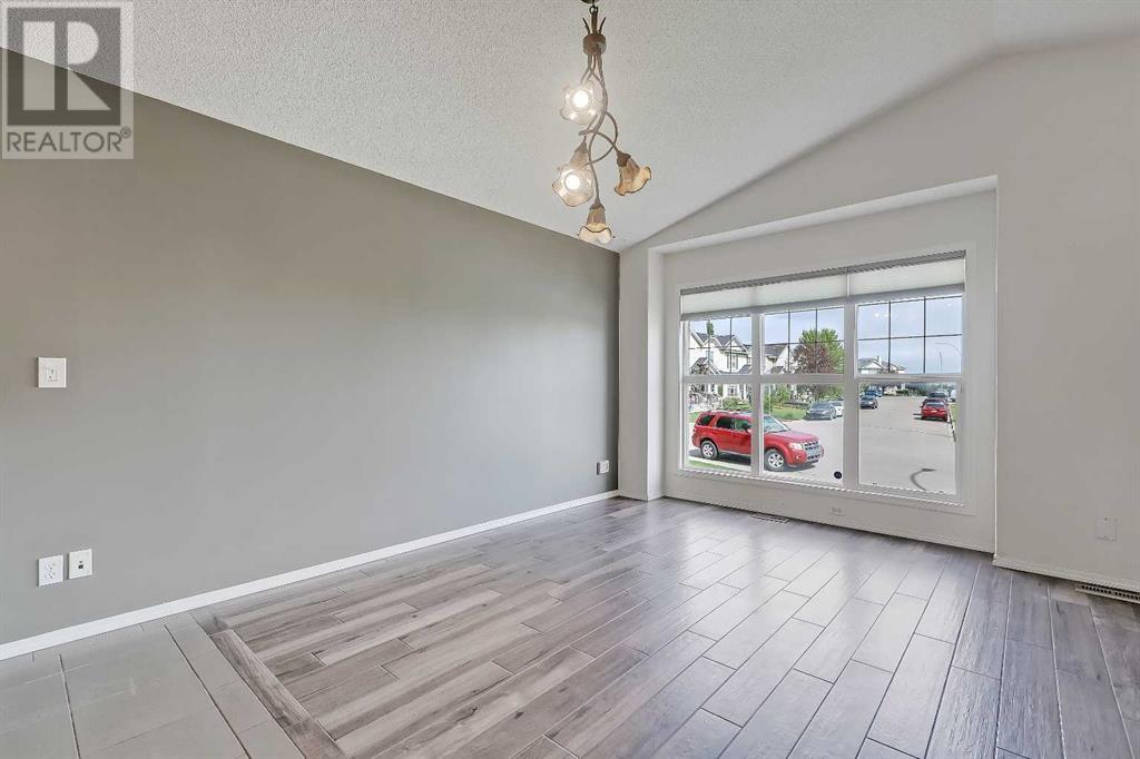 Single Family House Bungalow for Sale in  Cramond Green SE Cranston Calgary 