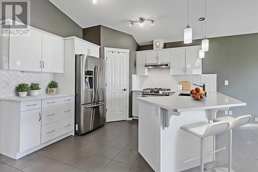 Single Family House Bungalow for Sale in  Cramond Green SE Cranston Calgary 