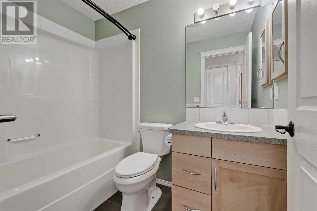 Single Family House Bungalow for Sale in  Cramond Green SE Cranston Calgary 