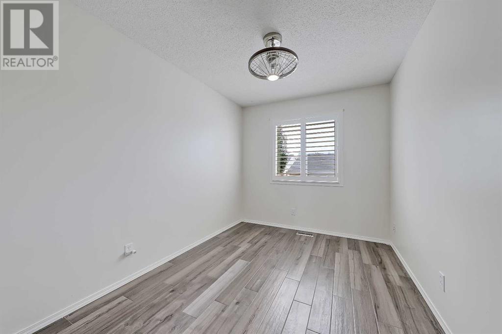 Single Family House Bungalow for Sale in  Cramond Green SE Cranston Calgary 