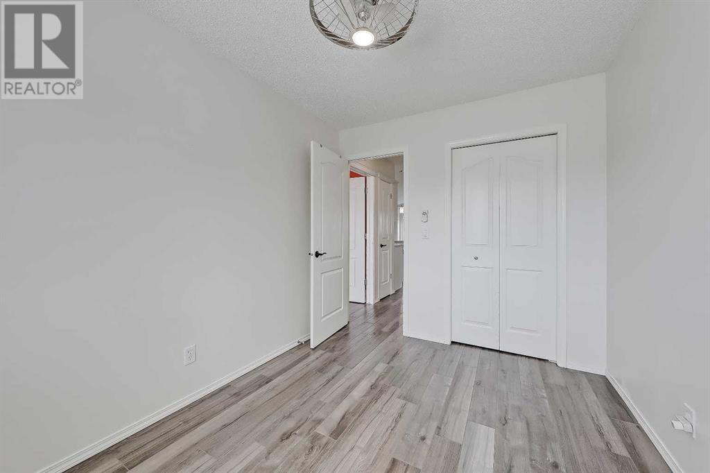 Single Family House Bungalow for Sale in  Cramond Green SE Cranston Calgary 