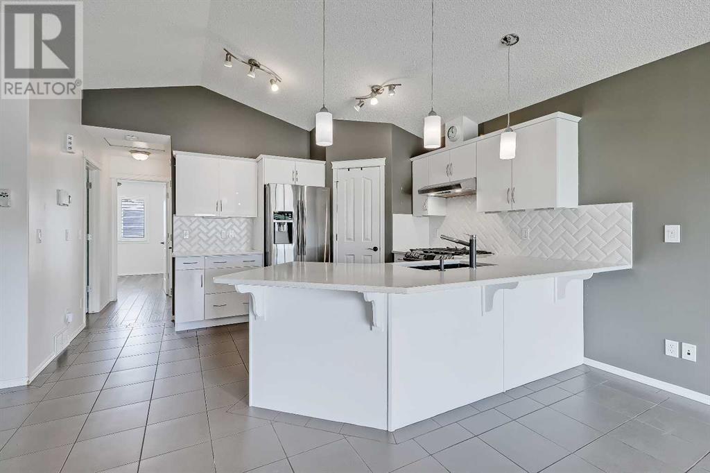 Single Family House Bungalow for Sale in  Cramond Green SE Cranston Calgary 