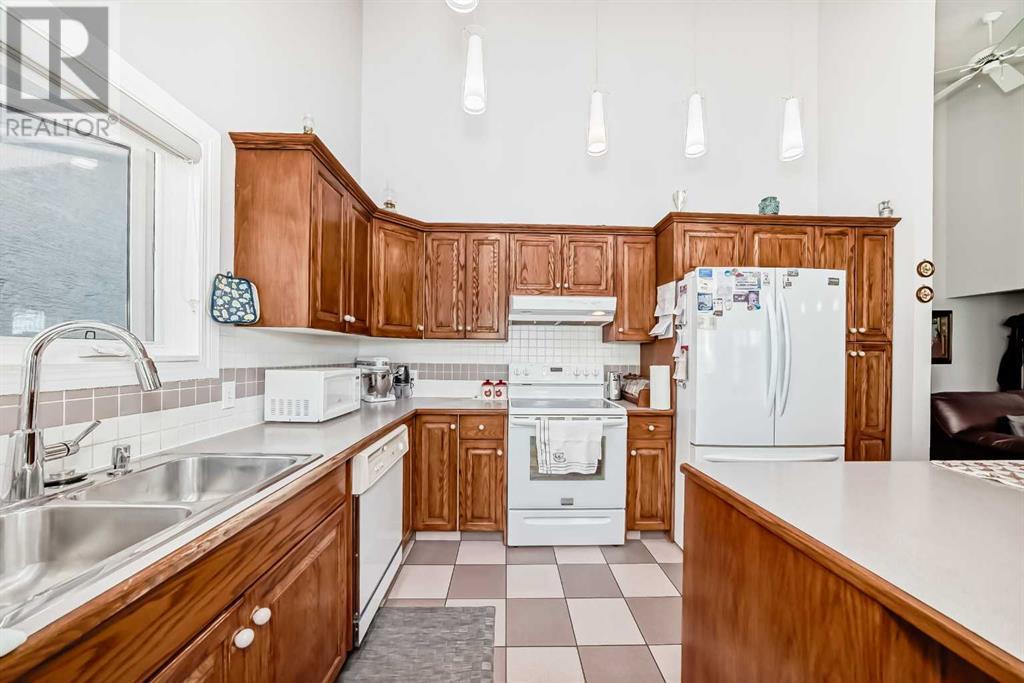 Single Family House Bungalow for Sale in  Signature Point SW Signal Hill Calgary 