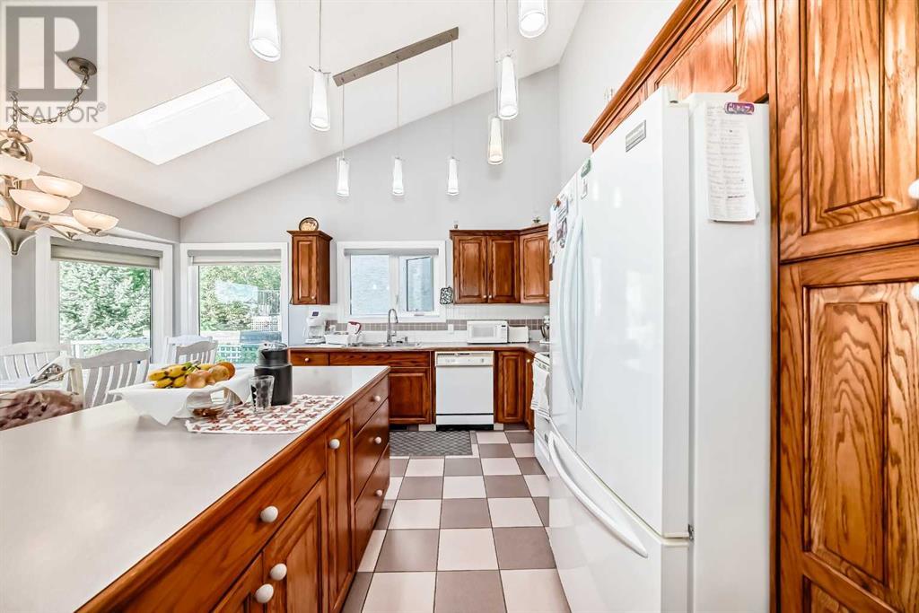 Single Family House Bungalow for Sale in  Signature Point SW Signal Hill Calgary 