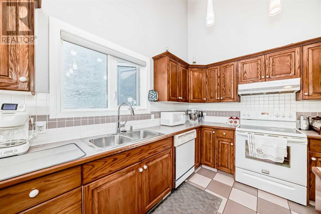 Single Family House Bungalow for Sale in  Signature Point SW Signal Hill Calgary 