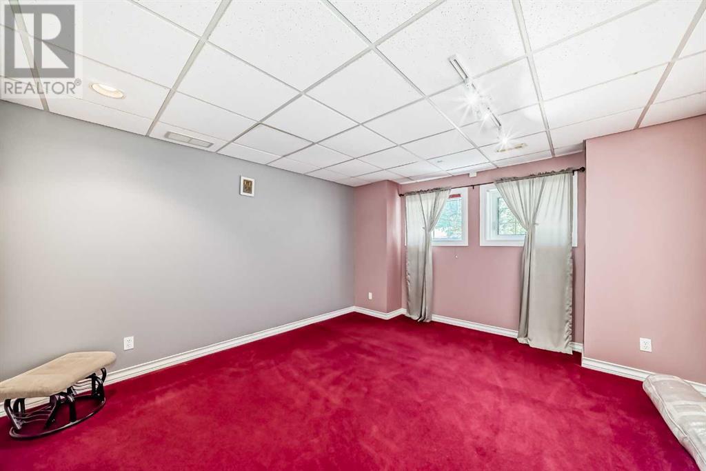 Single Family House Bungalow for Sale in  Signature Point SW Signal Hill Calgary 