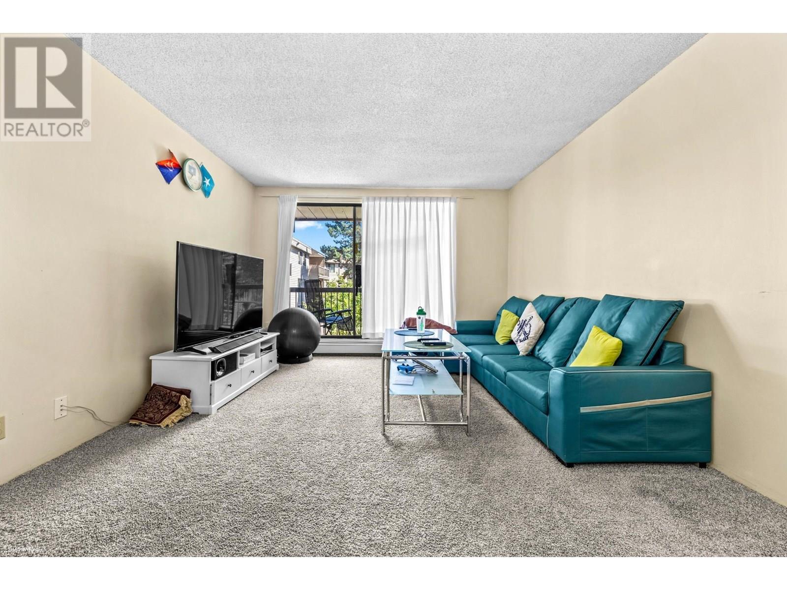 #211-8400 LANSDOWNE Road, Richmond