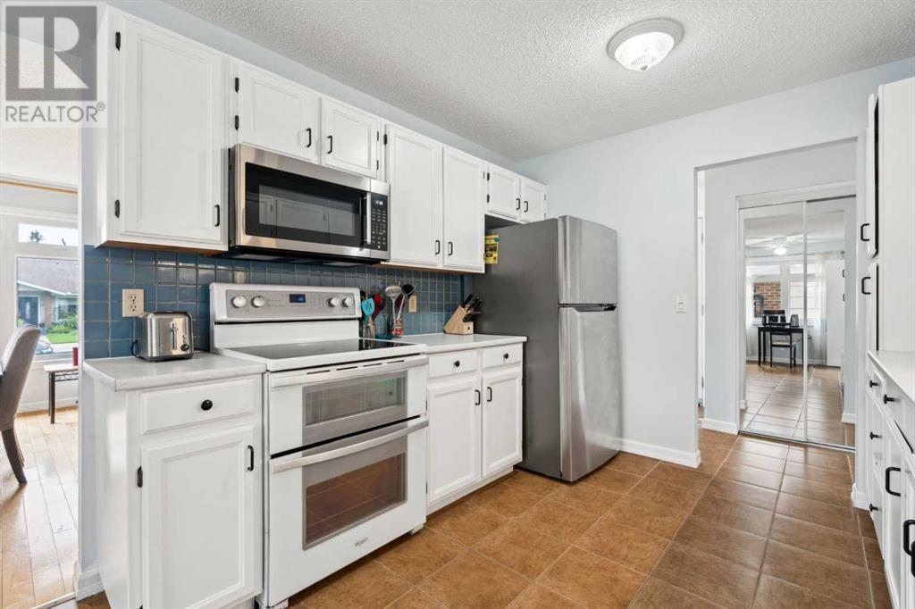 Single Family House Bungalow for Sale in  Sunhurst Road SE Sundance Calgary 