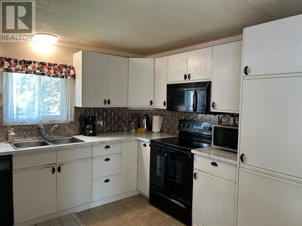 Single Family House Mobile Home for Sale in    Avenue SE Red Carpet Calgary 