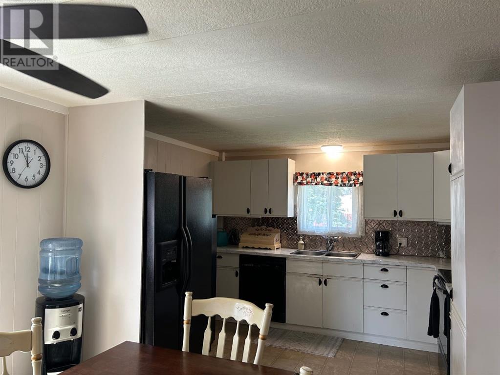 Single Family House Mobile Home for Sale in    Avenue SE Red Carpet Calgary 