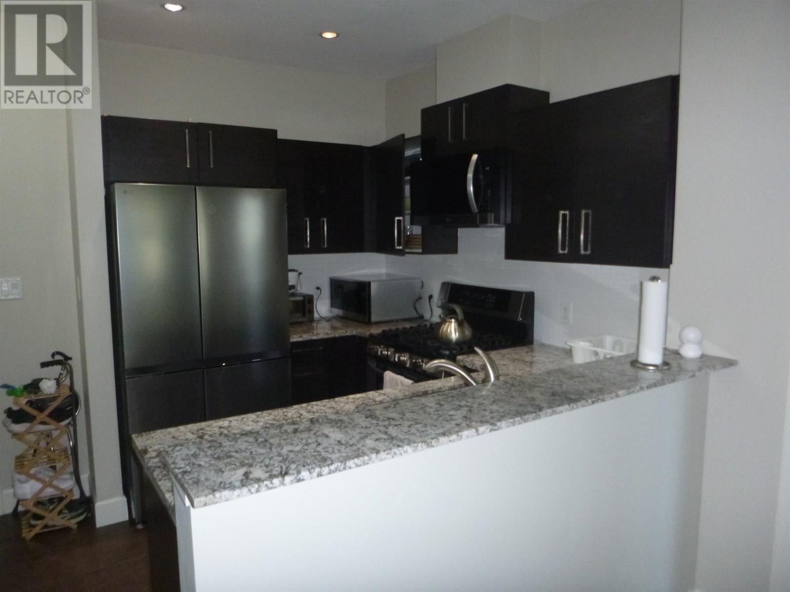 Photo 1 of 206 6611 Eckersley Road, Richmond BC