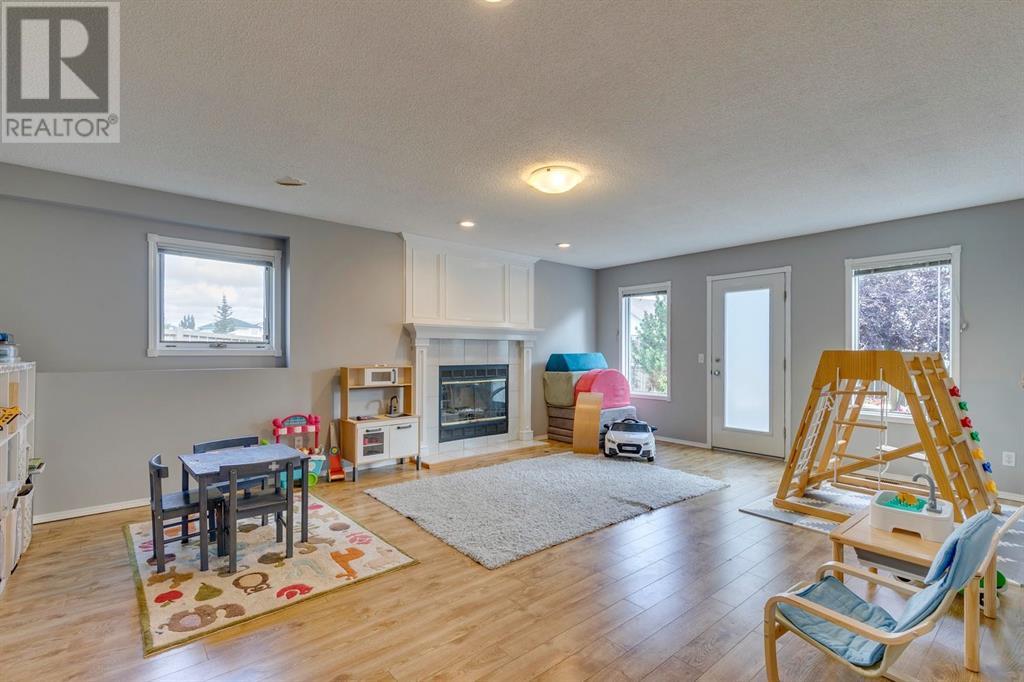 Single Family House 4 Level for Sale in  Hawkville Close NW Hawkwood Calgary 