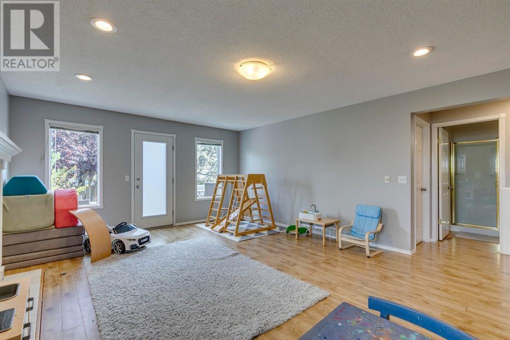 Single Family House 4 Level for Sale in  Hawkville Close NW Hawkwood Calgary 
