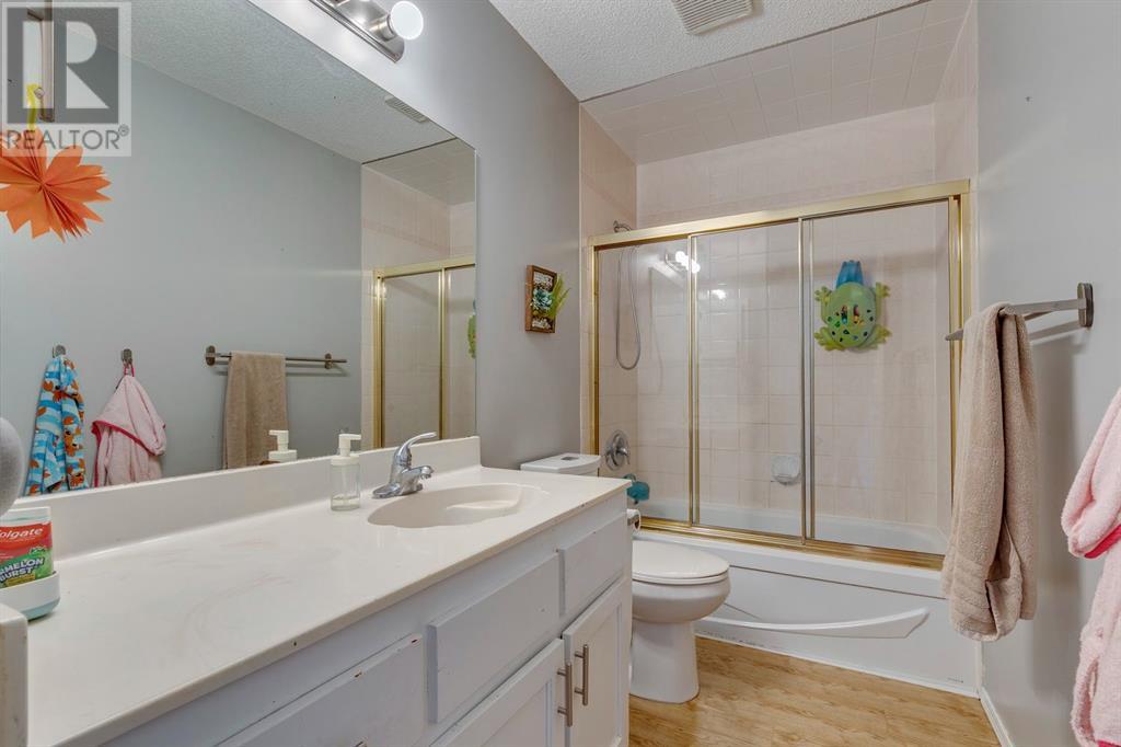 Single Family House 4 Level for Sale in  Hawkville Close NW Hawkwood Calgary 