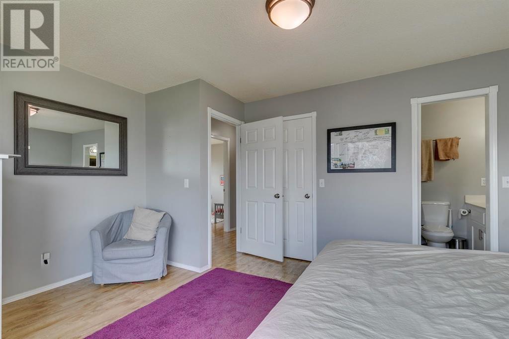 Single Family House 4 Level for Sale in  Hawkville Close NW Hawkwood Calgary 