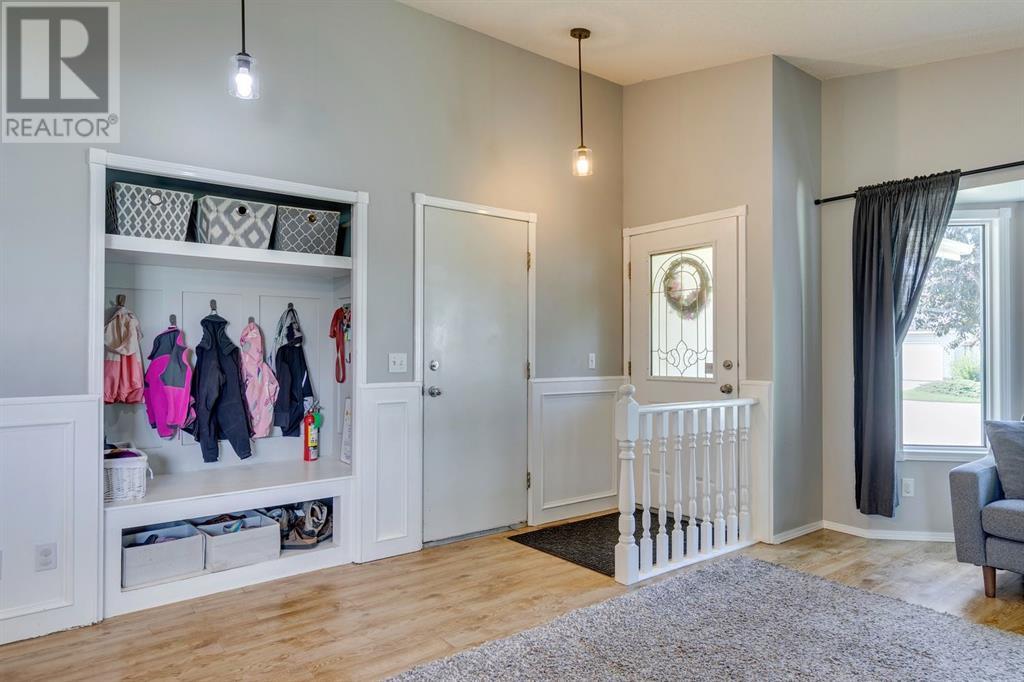 Single Family House 4 Level for Sale in  Hawkville Close NW Hawkwood Calgary 