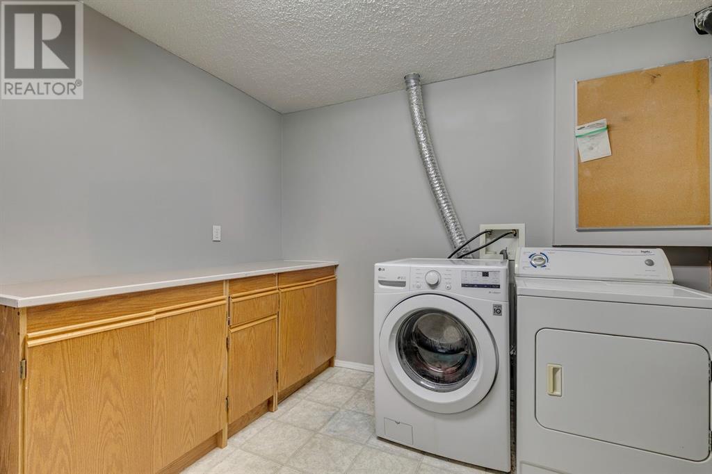 Single Family House 4 Level for Sale in  Hawkville Close NW Hawkwood Calgary 