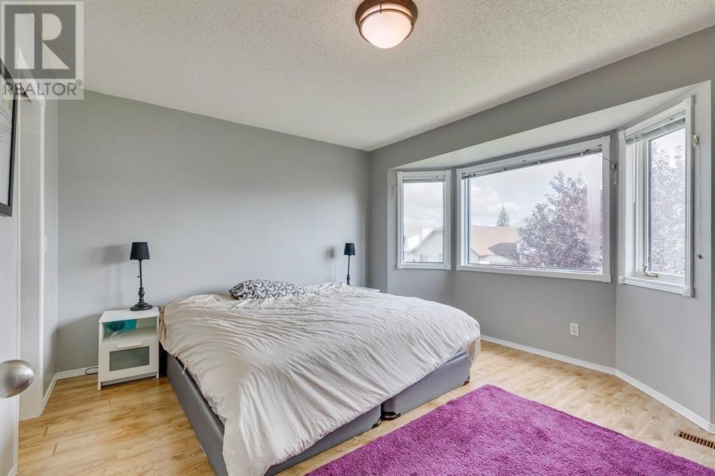 Single Family House 4 Level for Sale in  Hawkville Close NW Hawkwood Calgary 