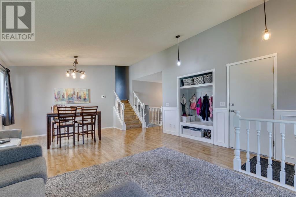 Single Family House 4 Level for Sale in  Hawkville Close NW Hawkwood Calgary 
