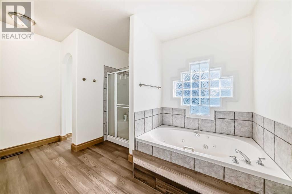 Single Family House Bungalow for Sale in  Simcoe Gate SW Signal Hill Calgary 