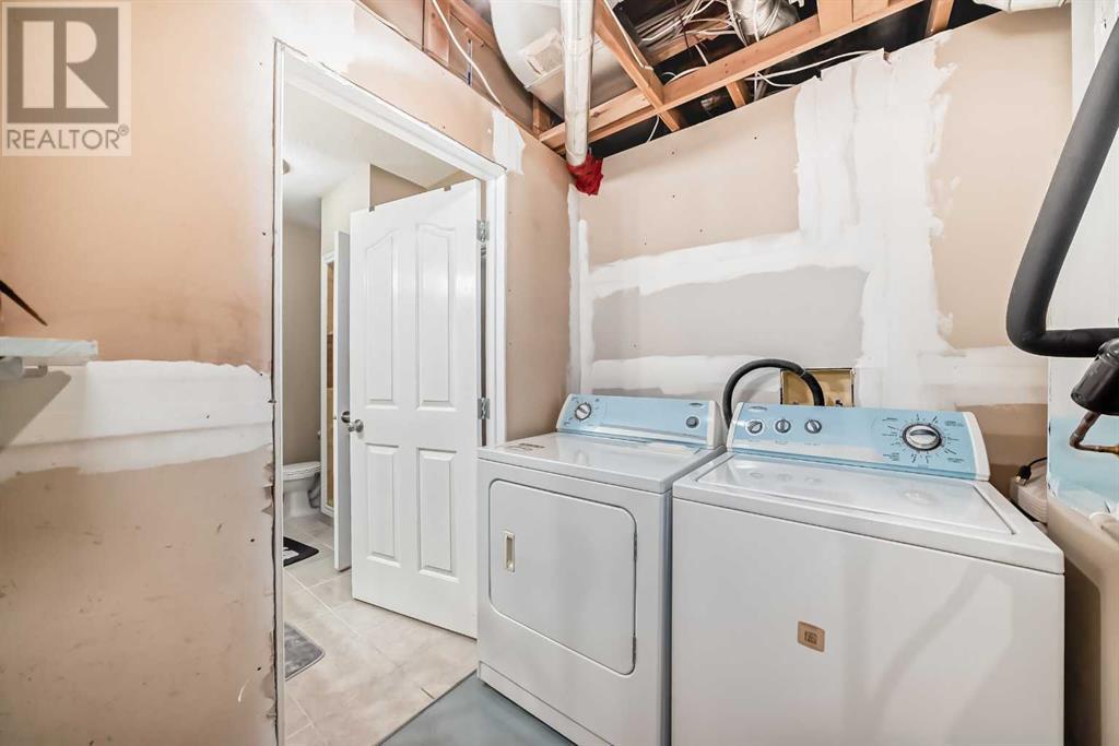 Single Family House Bungalow for Sale in  Simcoe Gate SW Signal Hill Calgary 