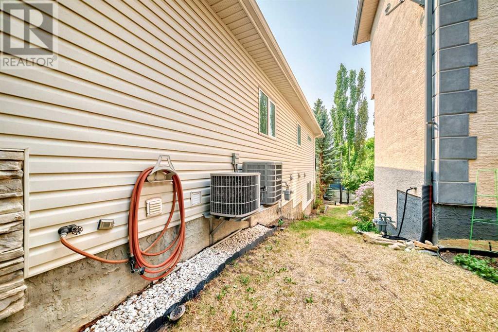 Single Family House Bungalow for Sale in  Simcoe Gate SW Signal Hill Calgary 