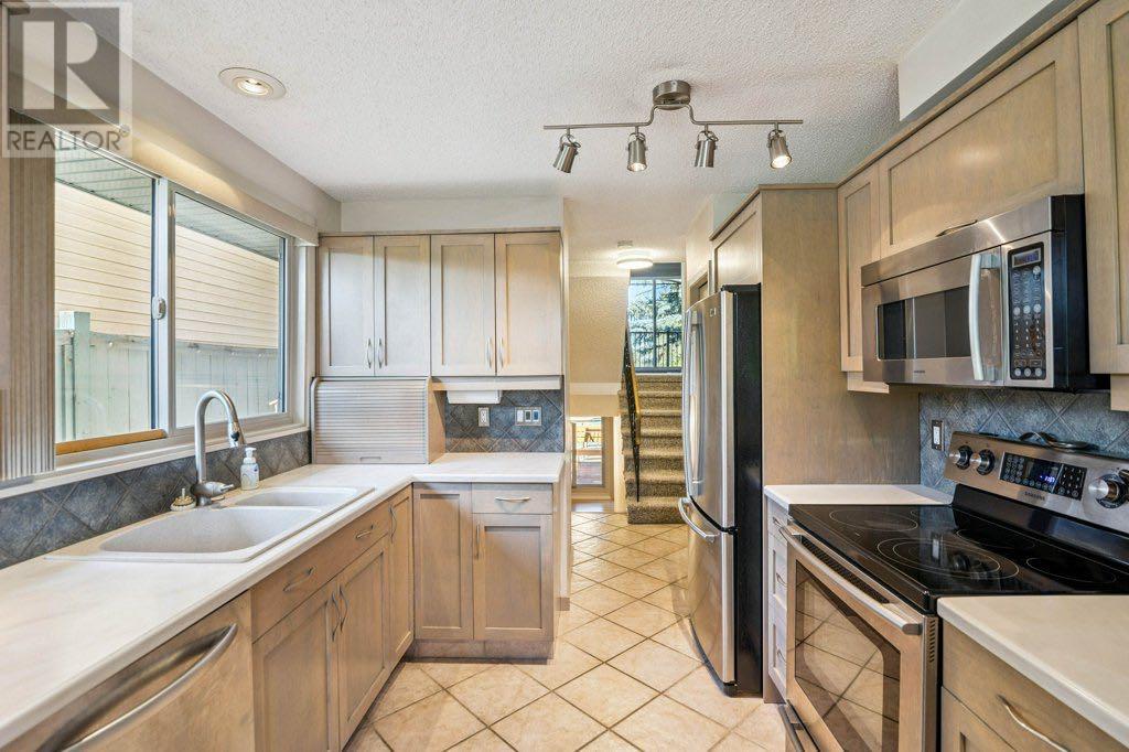 Single Family House 5 Level for Sale in  Mckinnon Crescent NE Mayland Heights Calgary 