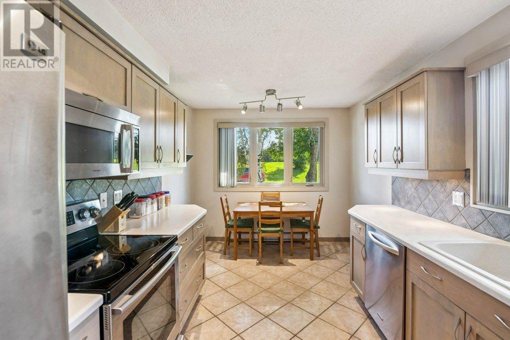 Single Family House 5 Level for Sale in  Mckinnon Crescent NE Mayland Heights Calgary 