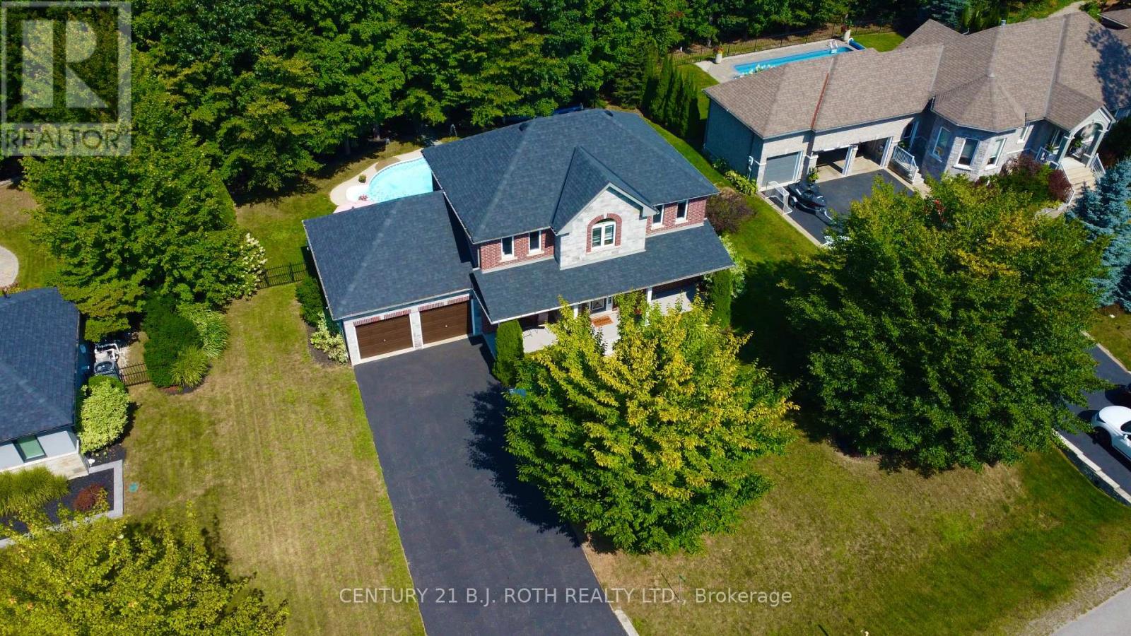 Photo 2 of 12 Lloyd Cook Drive E, Springwater ON