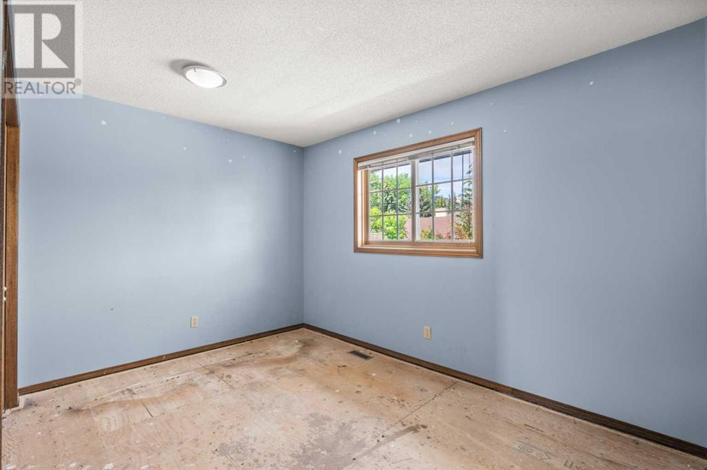 Single Family House for Sale in  Christie Park Hill SW Christie Park Calgary 