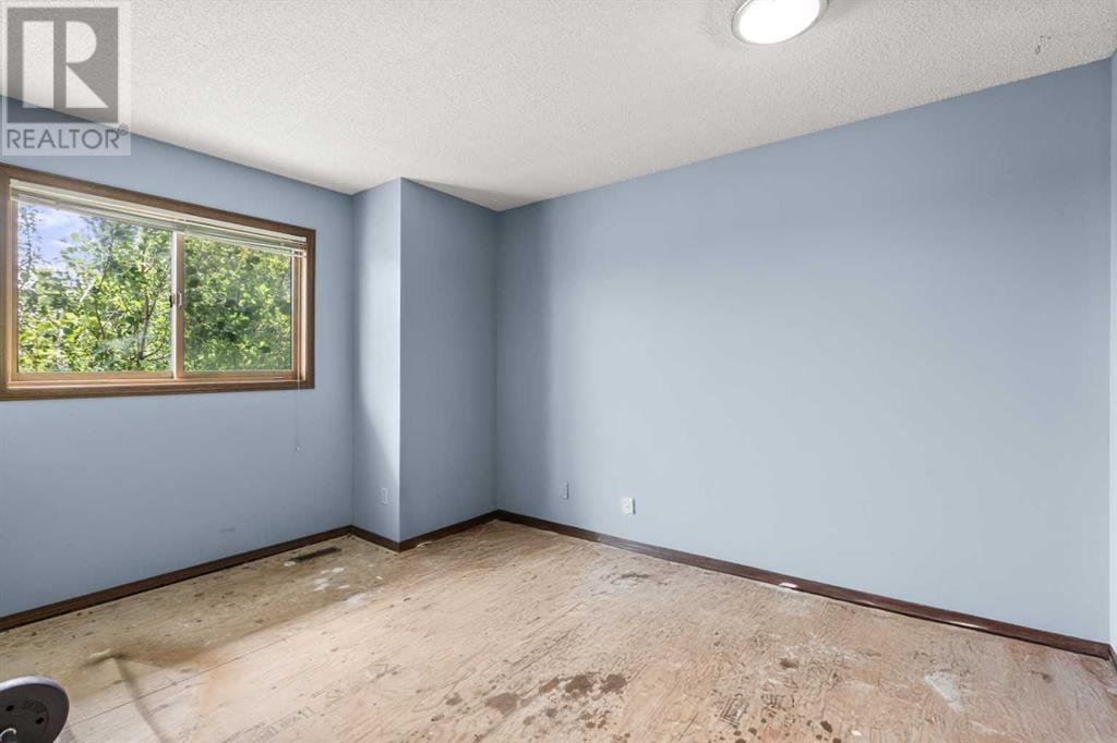 Single Family House for Sale in  Christie Park Hill SW Christie Park Calgary 