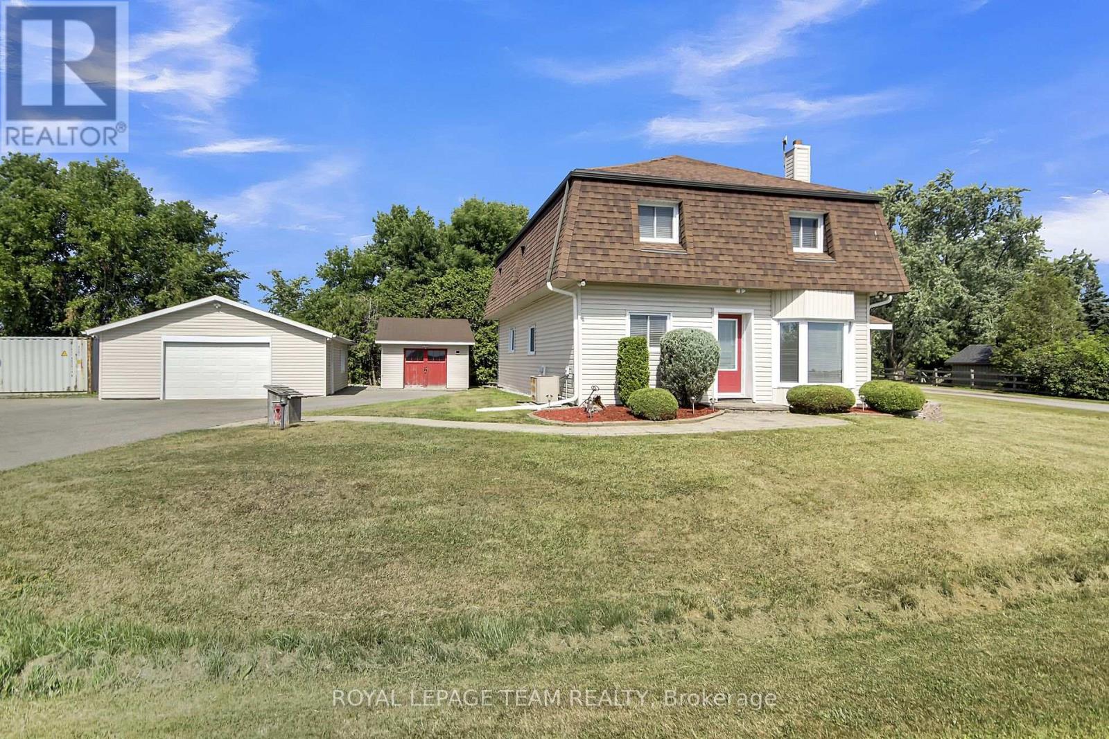 Detached Garage & shed.