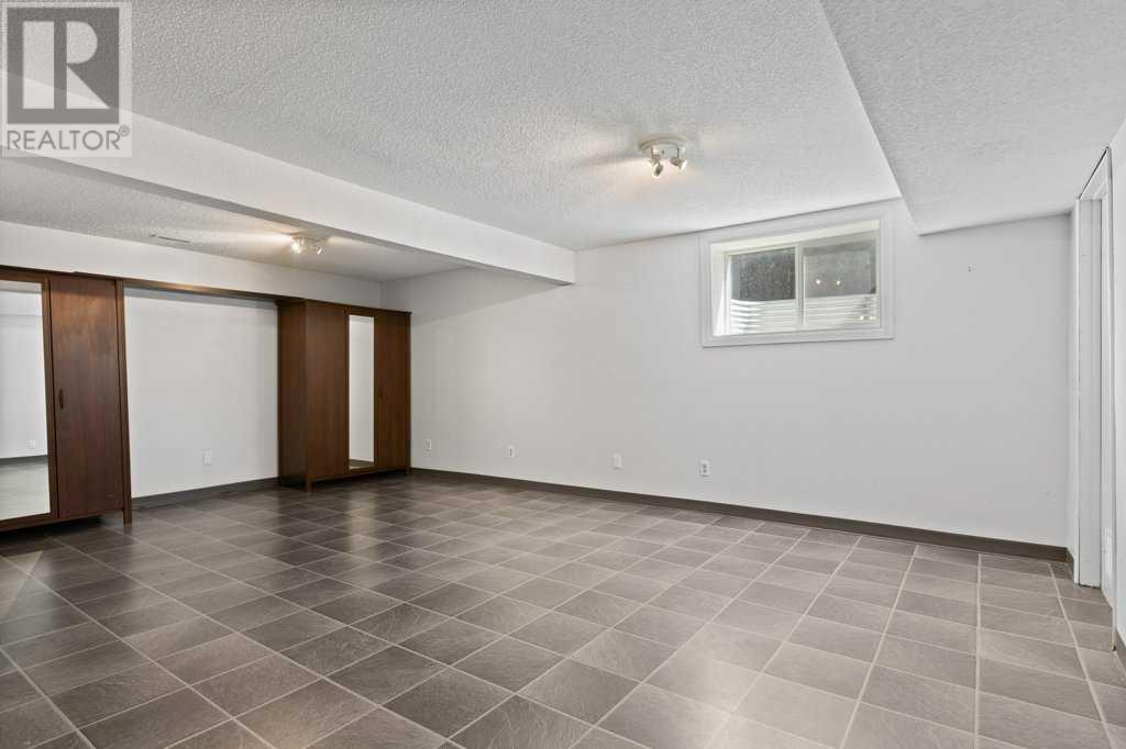 Single Family House Bungalow for Sale in  Brookpark Crescent SW Braeside Calgary 
