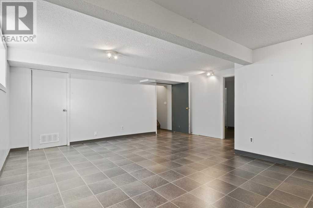 Single Family House Bungalow for Sale in  Brookpark Crescent SW Braeside Calgary 