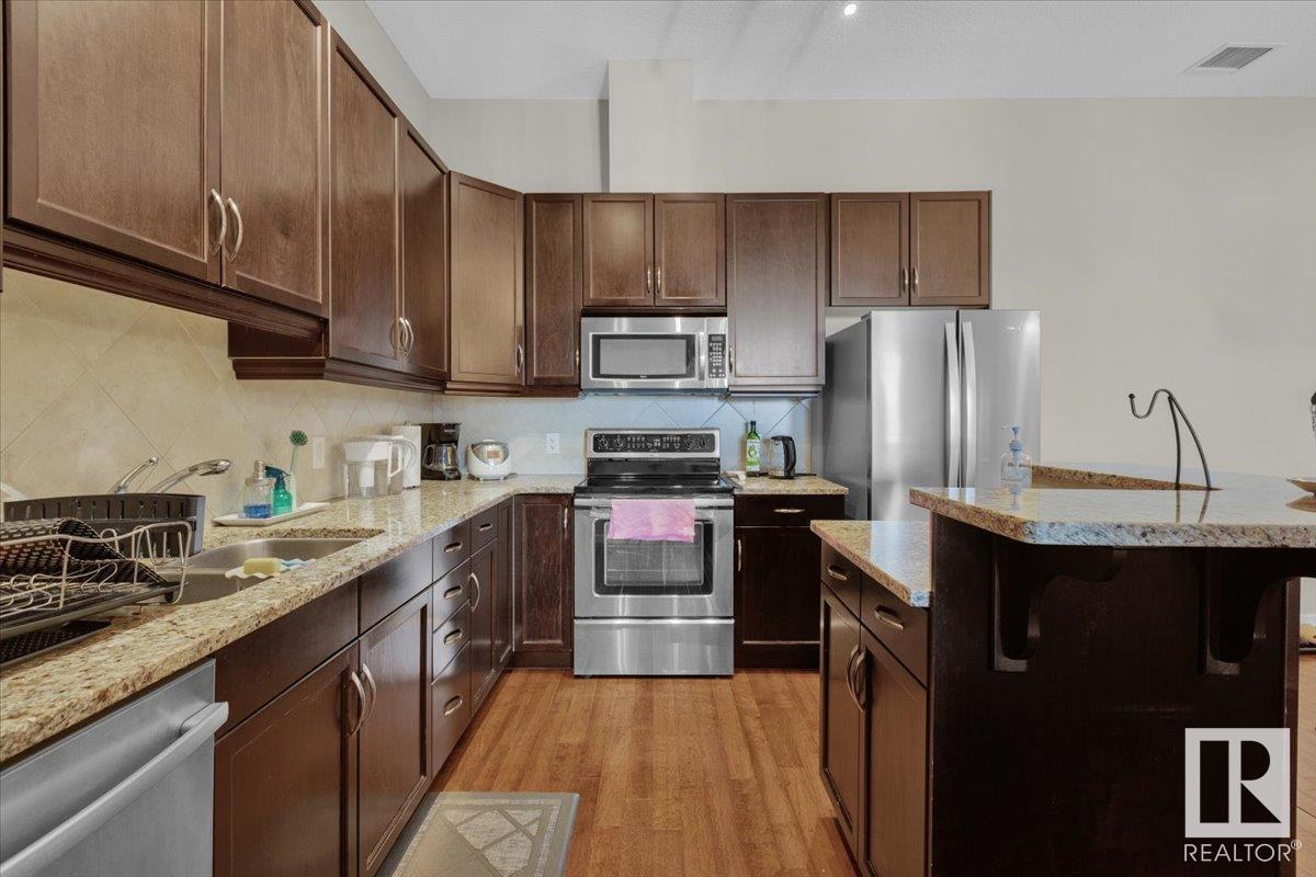 Photo 15 of 418 6083 Maynard Wy Nw, Edmonton AB