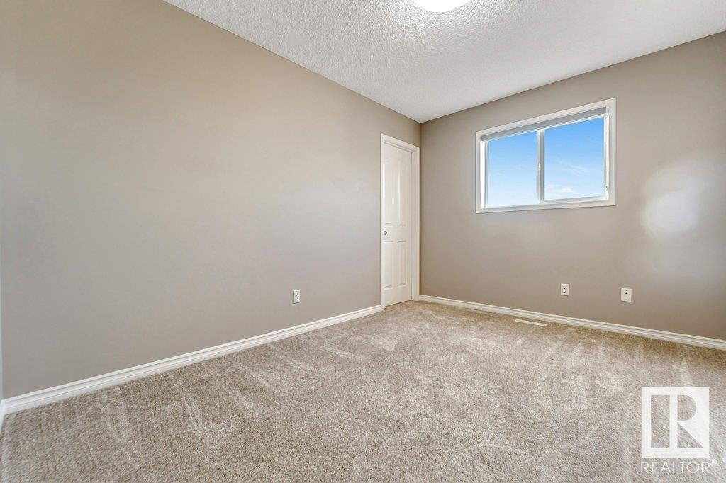 Photo 26 of 123 Champlain Pl, Beaumont AB