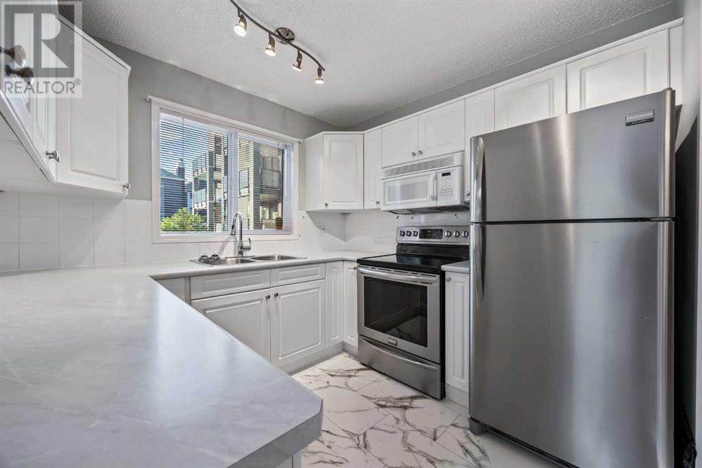Single Family House for Sale in   Sierra Morena Mews SW Signal Hill Calgary 