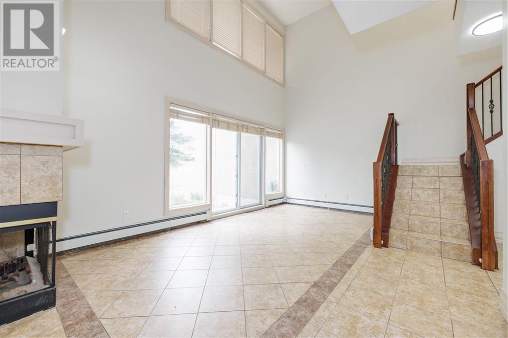 Single Family House Multi-level for Sale in   Village Mews SW Patterson Calgary 