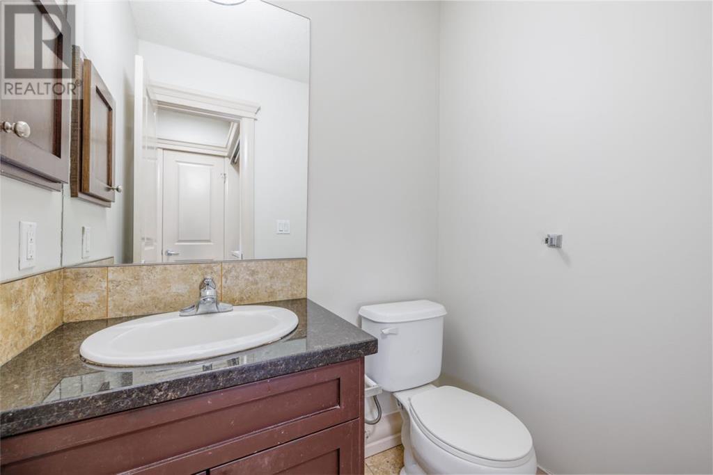 Single Family House Multi-level for Sale in   Village Mews SW Patterson Calgary 