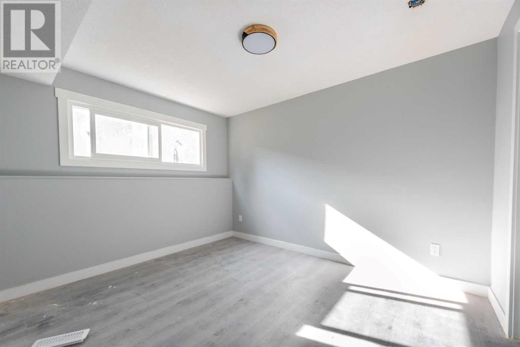 Multi-family House Bi-level for Sale in  Mcneill Road NE Mayland Heights Calgary 
