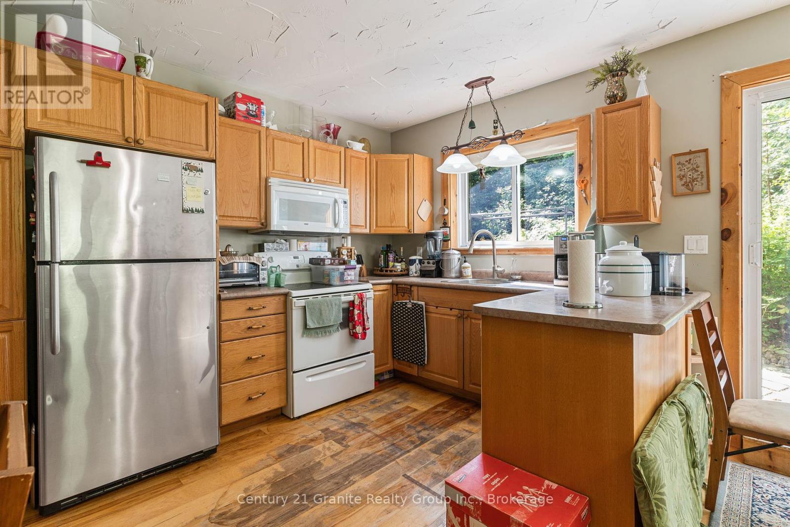 Photo 7 of 1029 Wigamog Road, Minden Hills ON