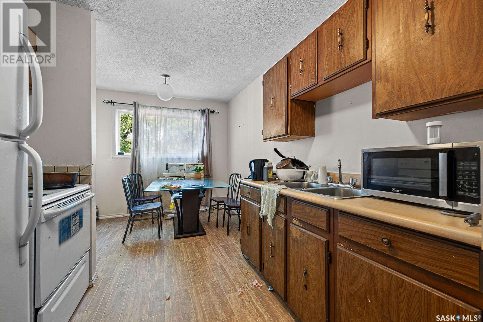 Single Family House 2 Level for Sale in  MCINTOSH STREET Regina 