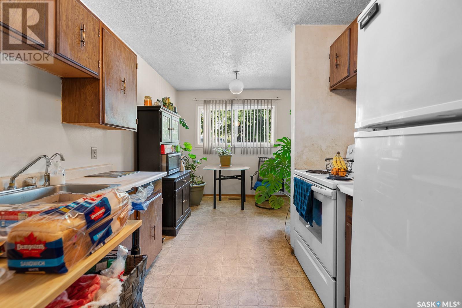 Single Family House 2 Level for Sale in  MCINTOSH STREET Regina 