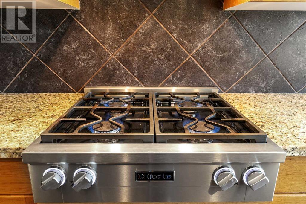 Photo 19 of 115 Cougarstone Court Sw, Calgary AB