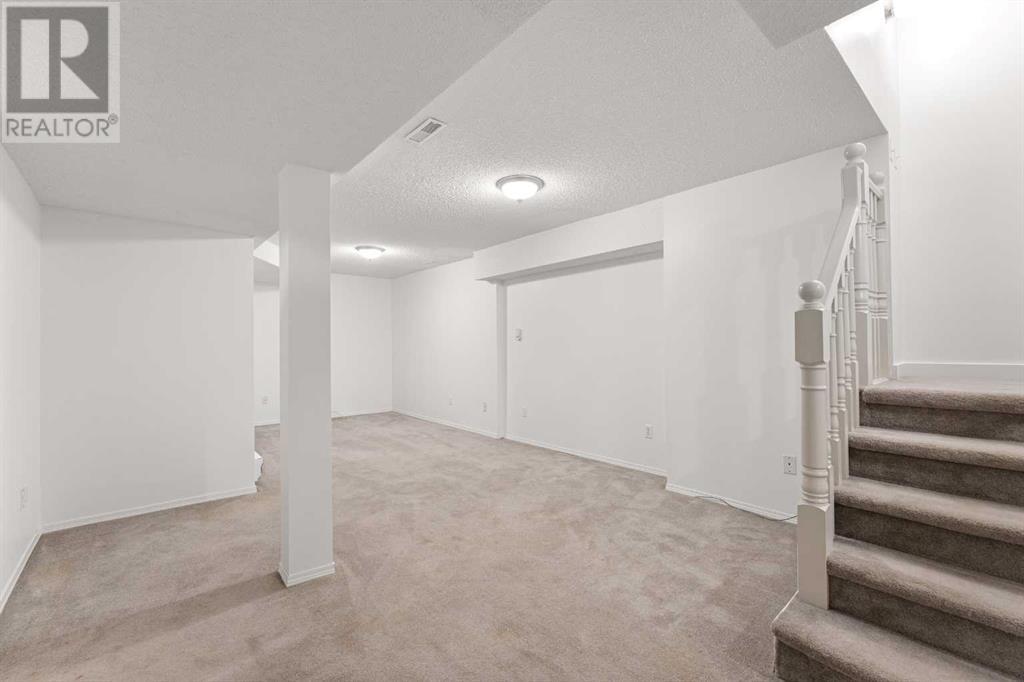 Single Family House for Sale in  Coachway Gardens SW Coach Hill Calgary 