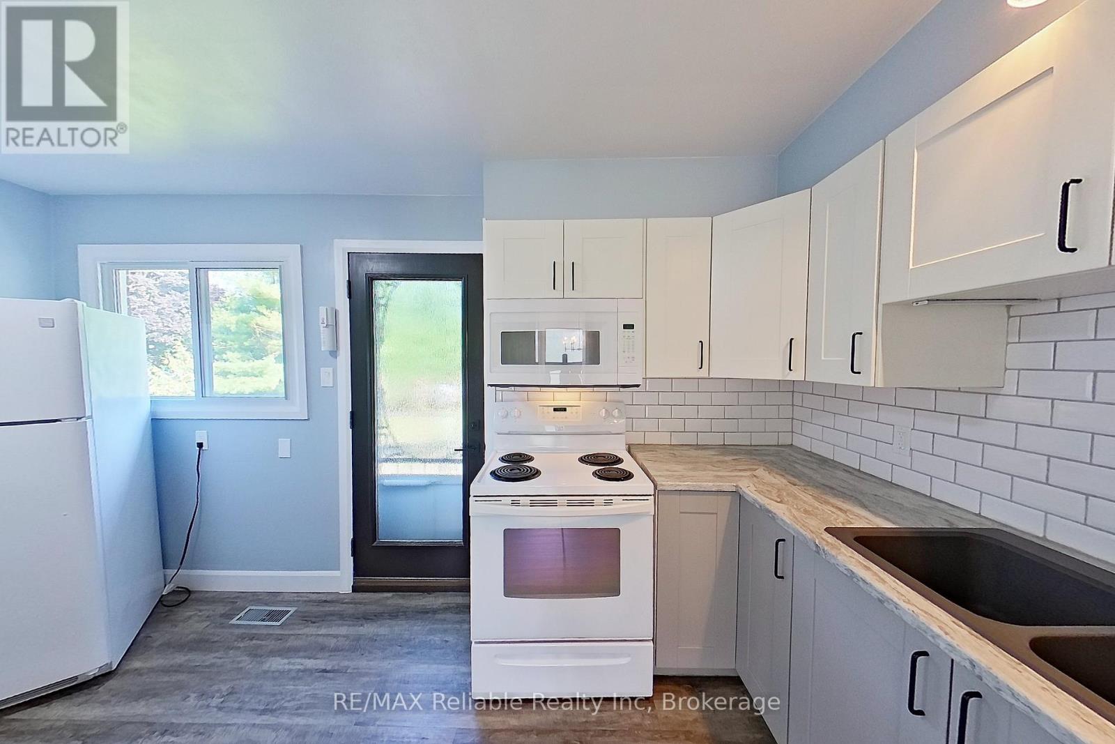 Photo 4 of 439 Queen Street E, Wellington North ON